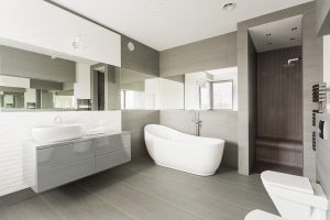 Modern bathroom with modern tub, sink and toilet fixtures