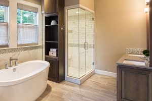 Bathroom subway tile floor and glass tile